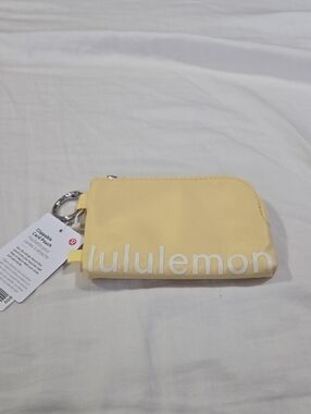 lululemon Yellow Clip-On Card Pouch with Silver Ring